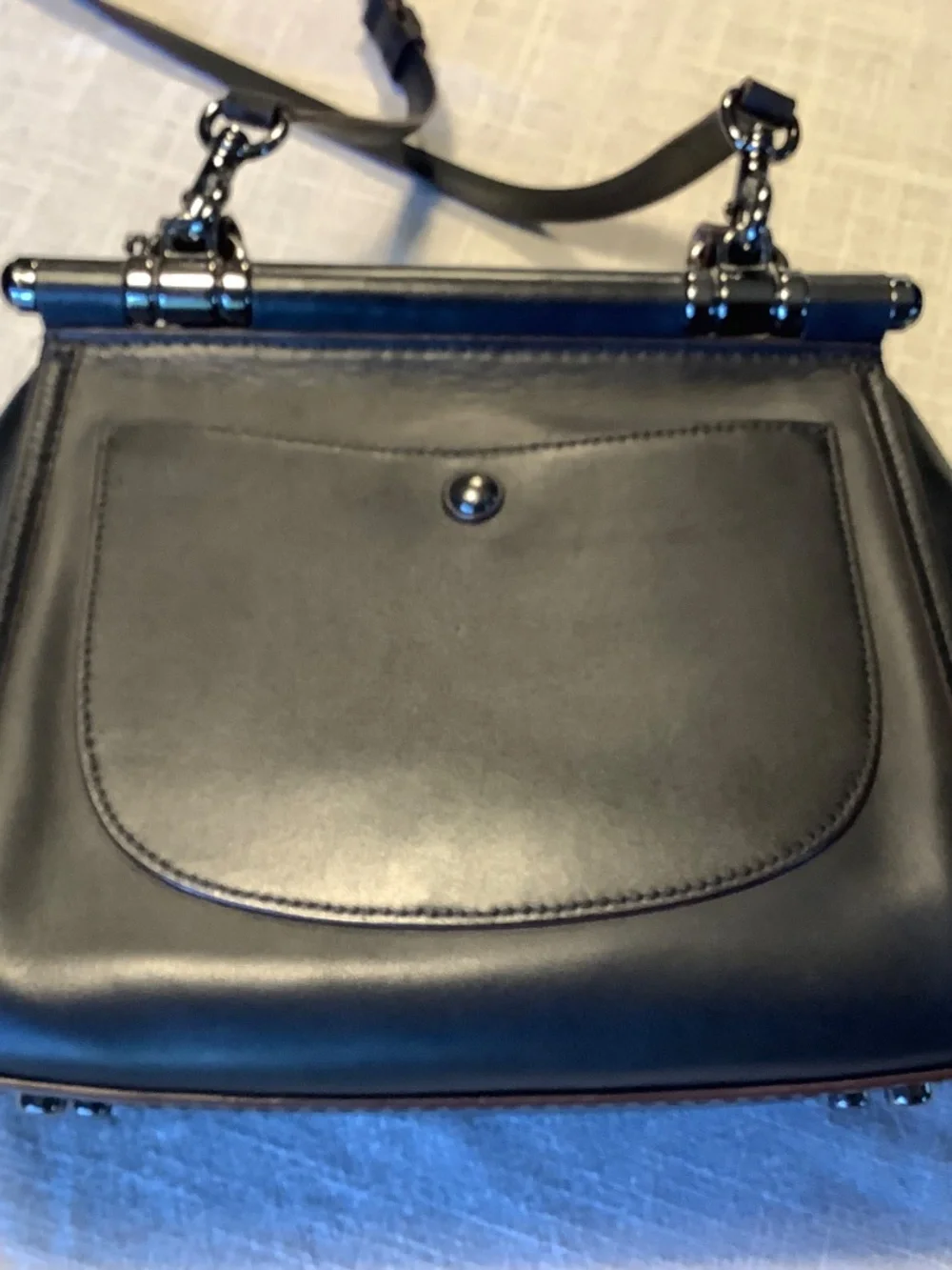 Coach Drifter top handled satchel with shoulder strap.